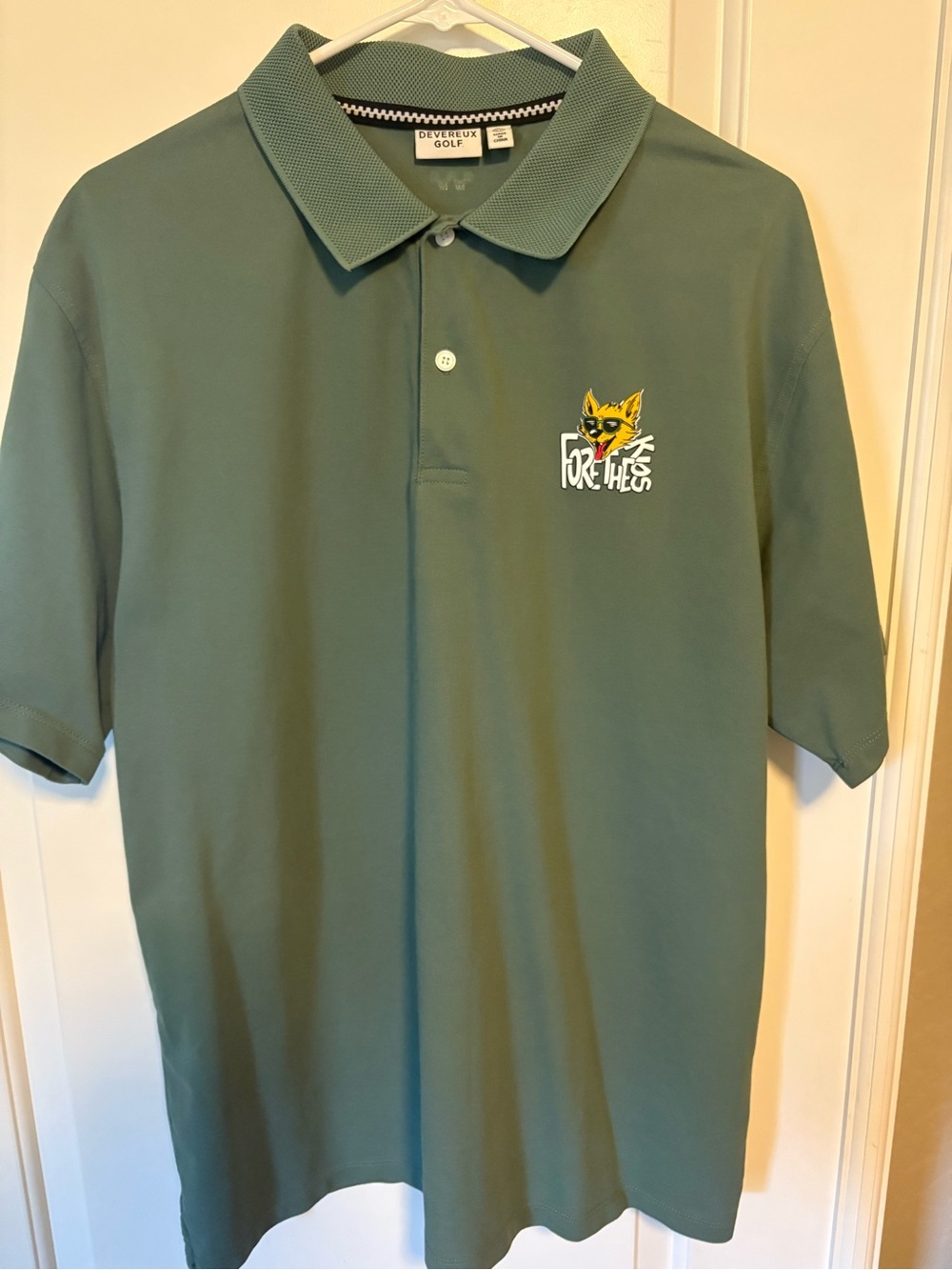 ⛳️⛳️⛳️ Men’s Green Polo Shirt with Fore-Hiss Logo- Fore the Kids Sticker